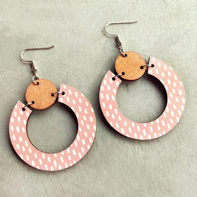 Best hoop earrings with geometric shapes for a modern and artistic appeal-Beautiful Pink Wood Circle Earrings