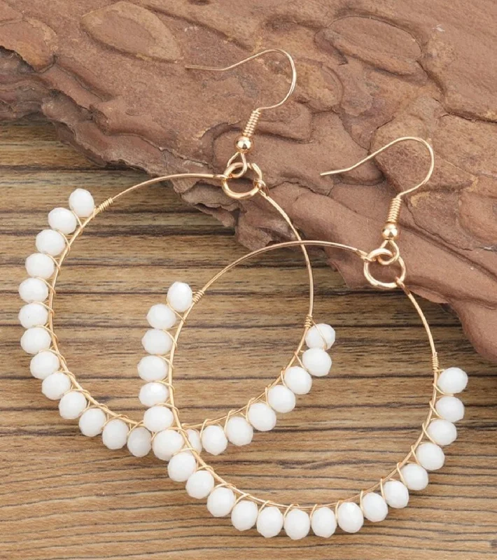 Hoop earrings with braided patterns for a detailed and textured finish-Beautiful White Beaded Hoop Earrings