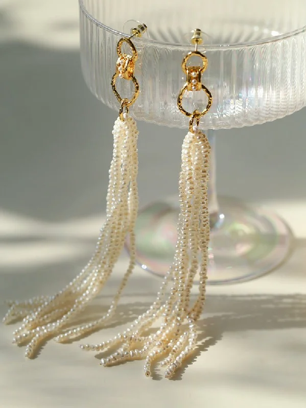 Hoop earrings with snake print designs for an edgy, wild appearance-Braided Long Rice Grain Pearl Earring