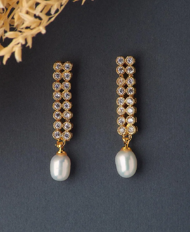 Hoop earrings with open designs for a modern, lighthearted vibe-Delicate Stone Studded Pearl Earring