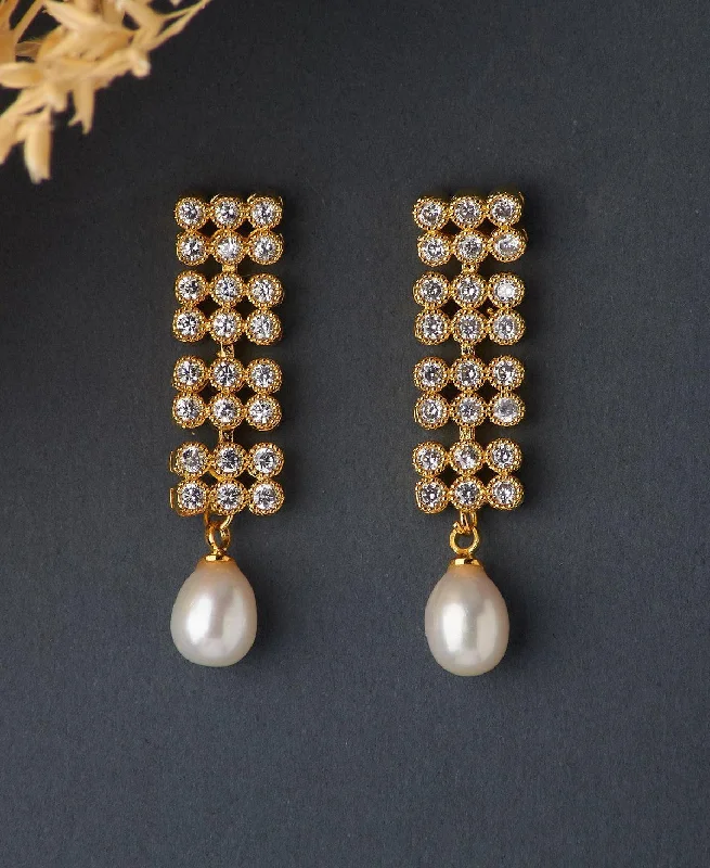 Best hoop earrings with butterfly motifs for a playful and whimsical appearance-Delicate Stone Studded Pearl Earring