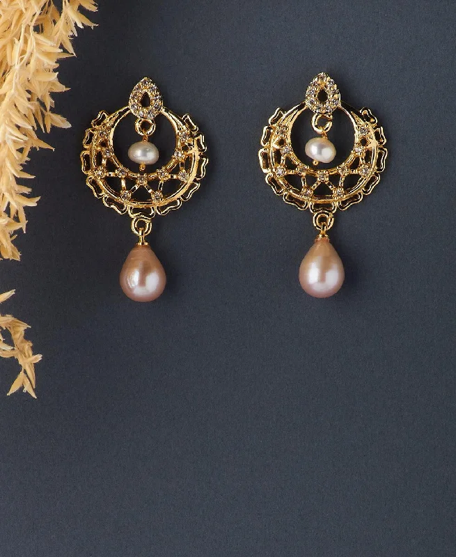 Hoop earrings with twisted metal designs for a dynamic and modern style-Delicate Stone Studded Pearl Hanging Earring