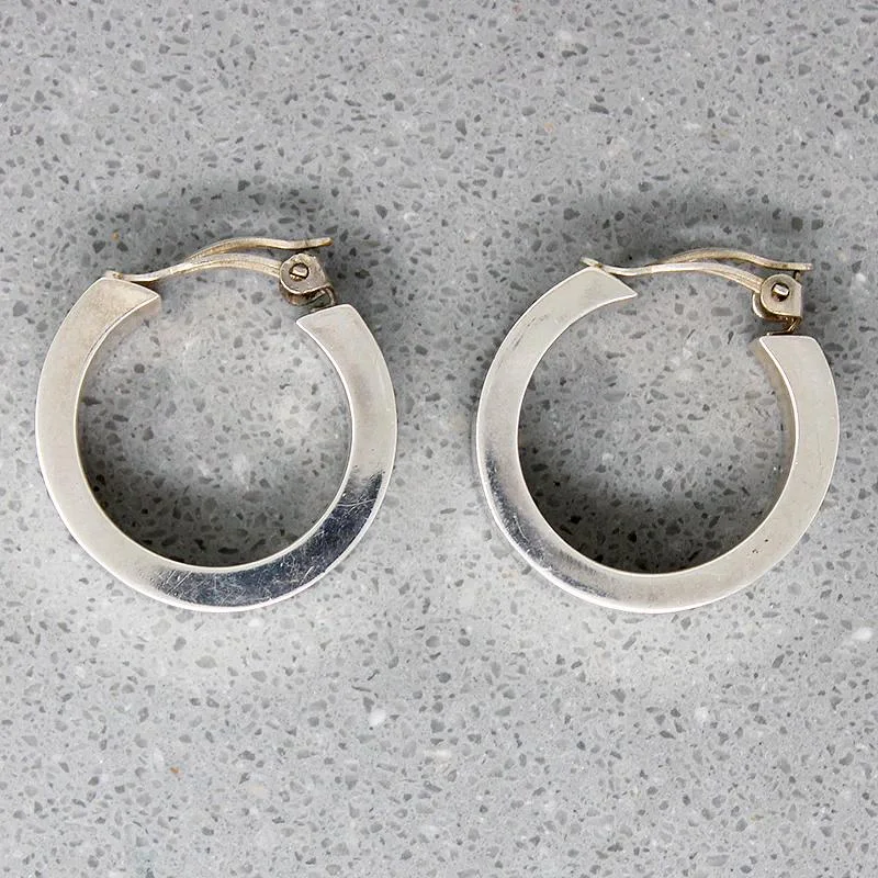 Hoop earrings with heart-shaped frames for a romantic and feminine look-Dramatic Oversized Sterling Silver Hoop Earrings