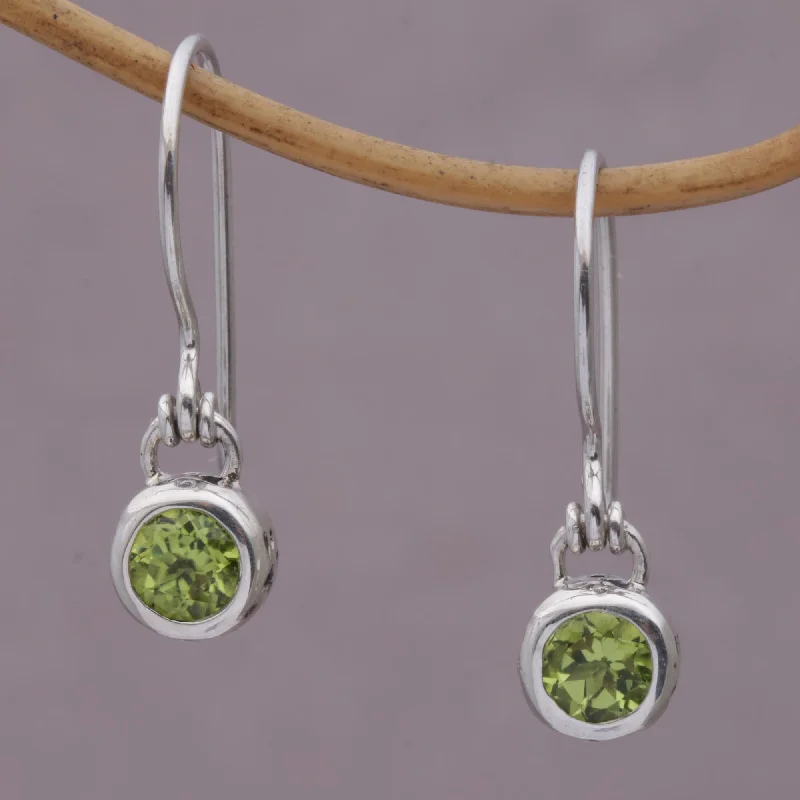 Best hoop earrings with blackened metal for an edgy and bold appearance-Glowing Paws Peridot and Sterling Silver Dangle Earrings from Bali