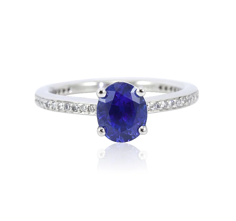 Rings with double bands for modern twist -Platinum 4-Prong OVAL Sapphire and Diamond Ring 0.25CTW