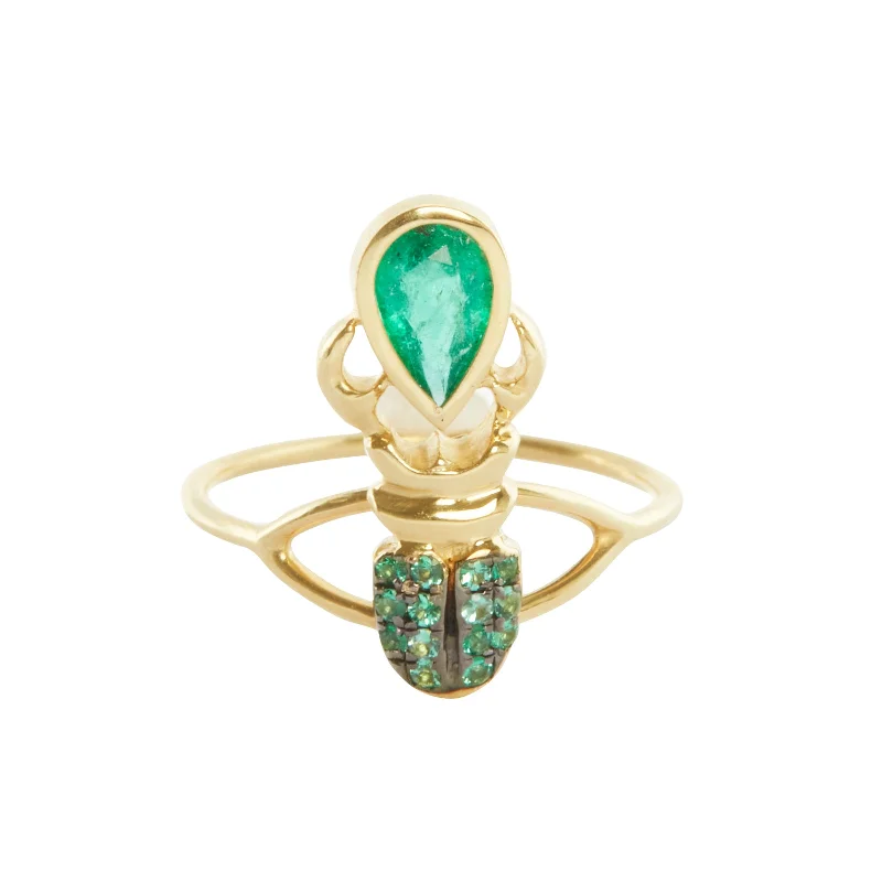 Rings with floral halo diamond arrangements -Emerald Khepri Ring