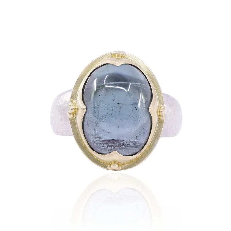 Rings with tiger eye bands for warmth -STEVEN BATTELLE STERLING SILVER AND 18K YELLOW GOLD CABOCHON BLUE TOURMALINE RING