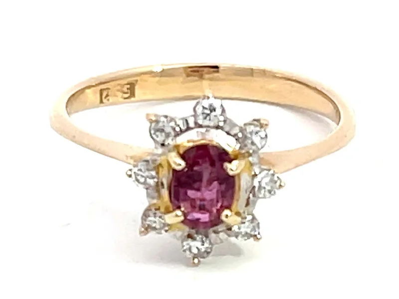 Bold rings with oversized amethyst gemstones -Oval Ruby and Diamond Halo Ring in 14k Yellow Gold